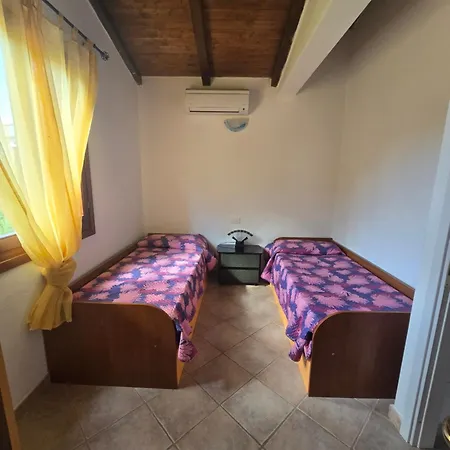 Dom wakacyjny Trilocale Climatizzato L'oleandro Tanaunella